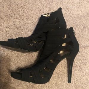 Black heels, gently worn.